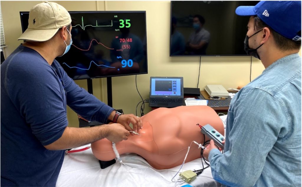 Residents participating in a EM simulation 