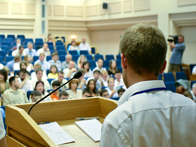 Image of Doctor giving lecture in auditorium