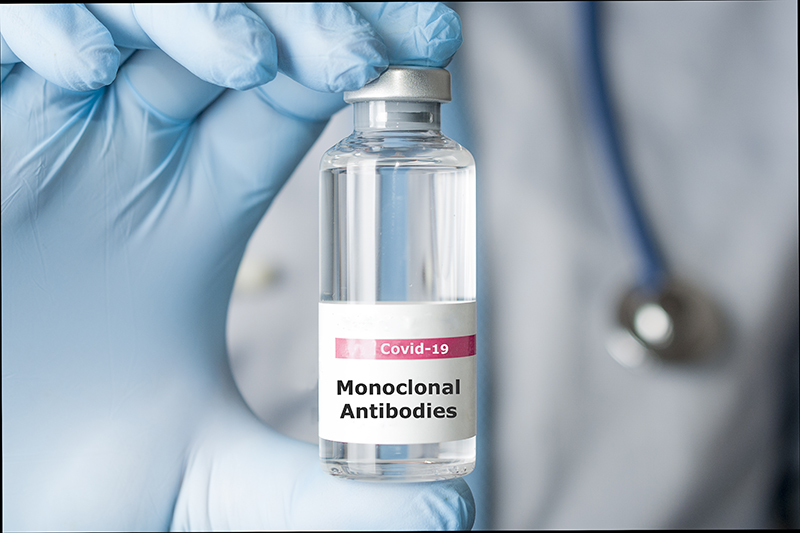 Doctor hold a vial of monoclonal antibodies, a new treatment for coronavirus Covid-19
