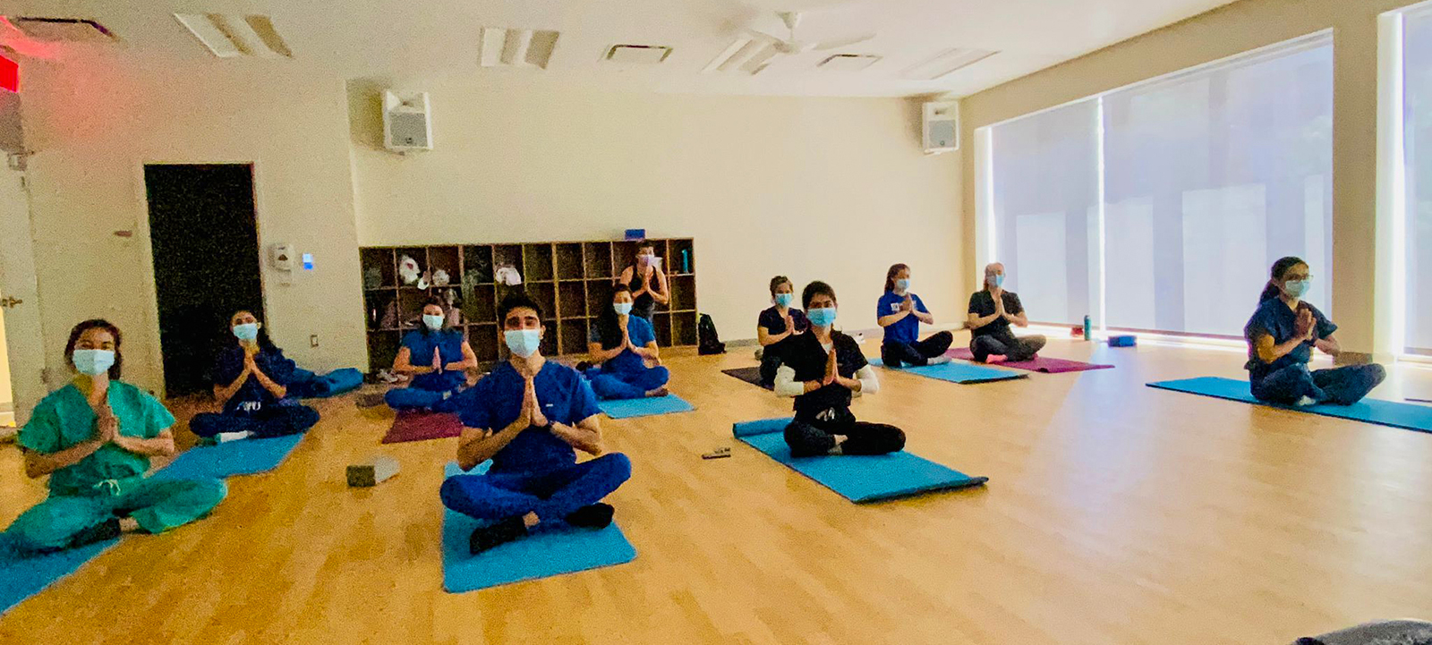 Picture of Pediatric Residents taking a yoga class at the SBH Health and Wellness Center