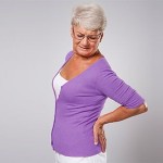 Image of woman with backpain