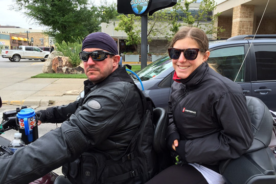Image of Dr. Robert Karpinos, MD, and daugher on bike
