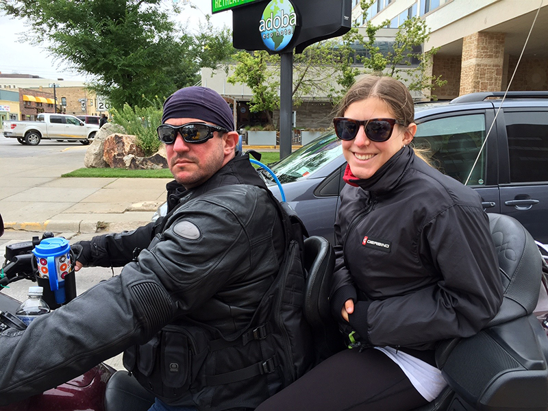 Image of Dr. Robert Karpinos, MD, and daugher on bike