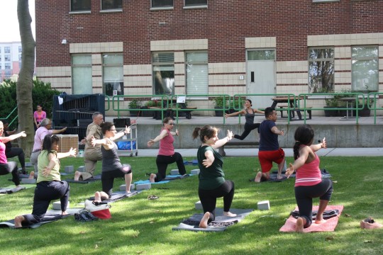 Image of Dr. J. Robin Moon Leading a Yoga Class for Employees at St. Barnabas Hospital