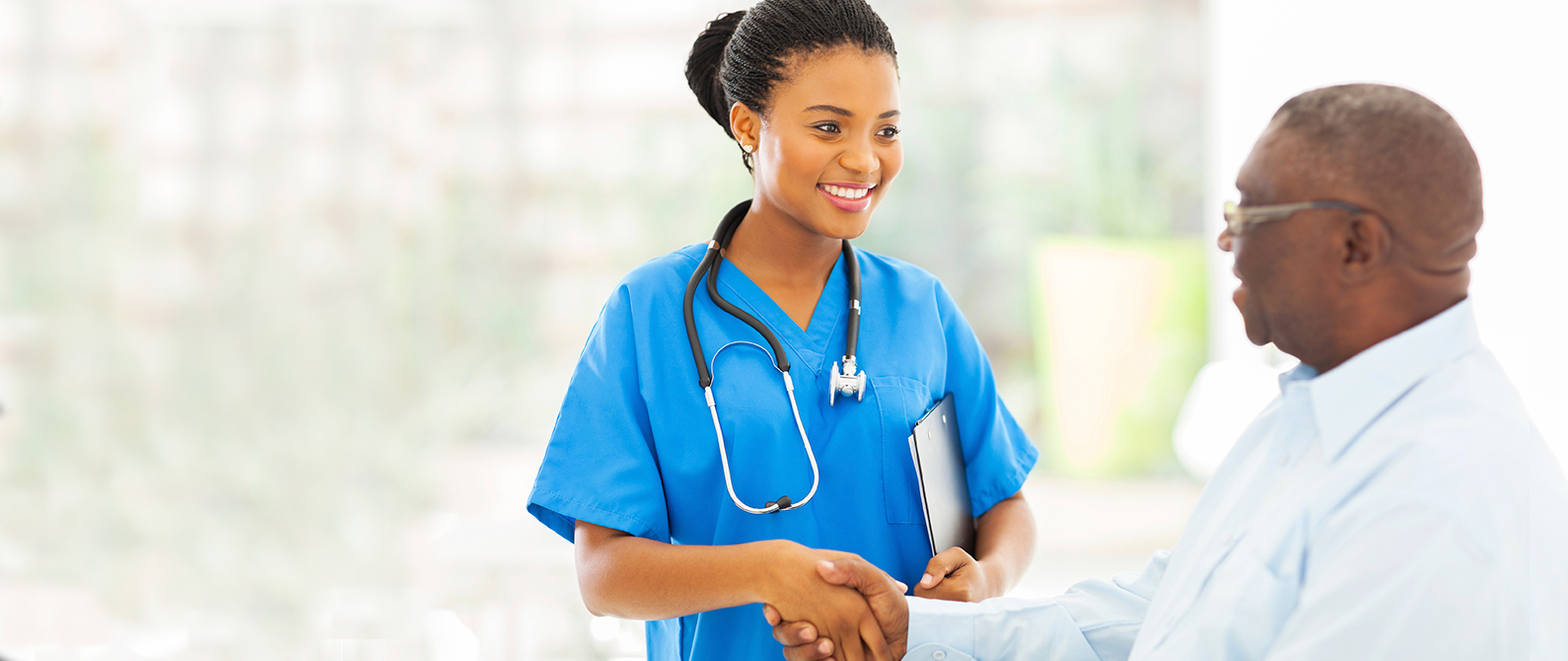 image of nurse shaking hand with patient